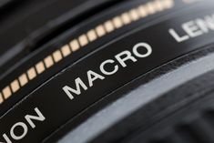 close up view of the macro lens on a canon eos - mount camera's nikon macro lens