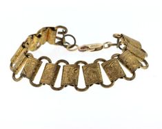 This beautiful antique piece came to us with no connecting ends. Maybe it was a bracelet or maybe it was a watch fob. We added a brand new 14k gold filled lobster claw and loop on the other end to make a lovely 7 inch bracelet. On each link is a varying scene of hand engraved detail featuring scroll work and orange blossoms common to this time period. The bracelet is comfortable to wear and would look great layered with other vintage bracelets.Condition: Very good vintage conditionSize: .6 inche Antique Rings Vintage, Antique Diamond Engagement Rings, Victorian Engagement Rings, Orange Blossoms, Antique Watch, Antique Bracelets, Art Deco Diamond Rings, Scroll Work, Floral Bracelet