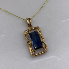 Discover the timeless elegance of our Vintage 18K Dark Blue Sapphire Pendant Necklace, designed to elevate any ensemble. These exquisite pieces blend classic sophistication with vintage charm, perfect for the discerning individual. Each necklace features a meticulously crafted pendant, available in 9K, 14K, or 18K solid gold, white gold, or rose gold, offering a radiant, opulent finish.  The centerpiece, a stunning dark blue sapphire, is expertly cut to highlight its natural brilliance and deep, Vintage Sapphire Necklace, Luxury Sapphire Necklace Hallmarked, Fine Jewelry With Rectangular Pendant For Formal Occasions, Elegant Hallmarked Rectangular Pendant Jewelry, Elegant Engraved Necklace With Rectangular Pendant, Elegant Rectangular Pendant Jewelry For Anniversary, Elegant Sterling Silver Necklaces With Stone Setting, Elegant 14k Gold Necklace With Rectangular Pendant, Formal Hallmarked Necklace With Rectangular Pendant