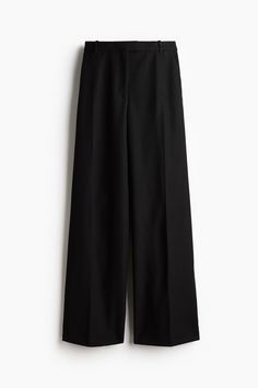 Dress pants in woven fabric. Extended waistband tab with hook-and-bar fastener and zip fly with concealed button. Diagonal side pockets  welt back pockets  and flared legs with creases at front and back. Flared Pants, Flare Pants, Dress Pants, Black Pants, Woven Fabric, Black Women, H&m, The Selection, Bar