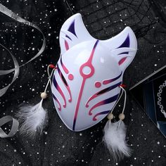 Wolf Mask Anime Fan of cosplay and manga? This anime wolf mask inspired by Japanese culture is made for you! Disguise yourself as your favorite heroes with this beautiful anime wolf mask. The perfect accessory to complete your cosplay or for a fancy dress party with friends and other festivals. Party mask: Ideal for Carnival, Christmas, Easter, New Year's Eve party, Halloween, discos, clubs. Comfortable to wear: Smooth curves to perfectly fit your face. Set included: 1x Anime wolf mask Meticulous details: Precise finishes for stunning rendering One size fits all Materials: PVC Size: 11.7 x 7.8 in FREE worldwide shipping Red Masks And Prosthetics For Cosplay Events, Red Mask For Cosplay, White Masks For Cosplay Events, Red Themed Cosplay Masks, Red Themed Masks For Cosplay, Themed Red Masks For Cosplay, White Fantasy Masks For Cosplay, White Fantasy Cosplay Mask, White Fantasy Style Cosplay Mask