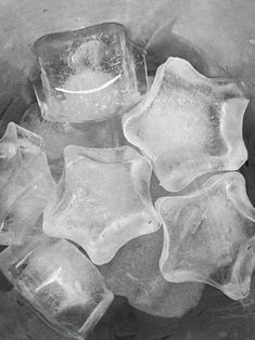 some ice cubes are sitting in a bowl