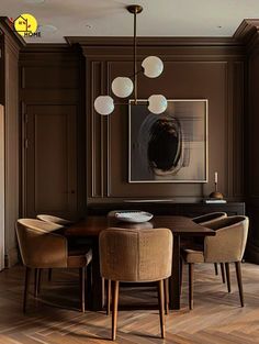 an elegant dining room with brown walls and wood flooring is featured in this image