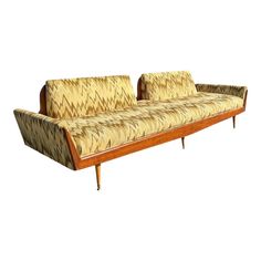 an old fashioned couch is shown on a white background