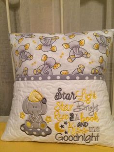 a baby pillow with an elephant on it's side and the words star light, dear night