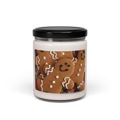 a glass jar filled with ginger cookies and icing