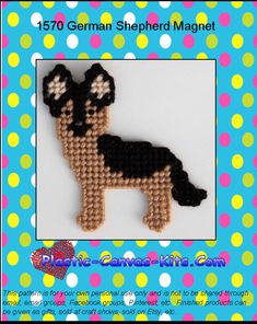 a small dog made out of beads on a blue and white background with polka dots