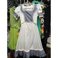 This Vintage Gunne Sax Dress Is A Stunning Addition To Any Wardrobe. The Prairie Style And Size 11 Apron Make It A Unique And Comfortable Piece For Any Occasion. The Brand Is Known For Its Quality And This Dress Is No Exception. The Dress Is Perfect For Those Who Love Vintage Clothing And Want To Add A Touch Of Prairie Style To Their Wardrobe. It's A Great Choice For A Special Event Or Even Just A Casual Day Out. Waist Is 14.5 Inches Top To Bottom 40.5 Armpit To Armpit 16.5 In Great Condition. U Convertible Wedding Dresses, Vintage Gunne Sax Dress, Silver Bridesmaid Dresses, Multiway Dress, Sax Dress, Gameday Dress, Gunne Sax Dress, Green Bridesmaid Dresses, Prairie Style