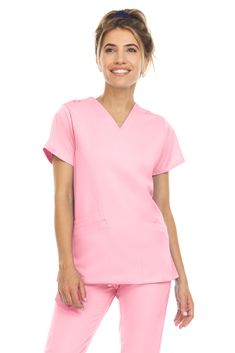 PRICES MAY VARY. ULTRA-COMFORTABILITY: Scrub tops created using ultra-soft and ultra-comfy polyspandex fabric that keeps you warm, relaxed, and stylish throughout your entire day! MULTIPLE FEATURES: Created using 4-way stretch fabric, these scrub tops also contain three methodical pockets and side slits for ultimate freedom COLORS GALORE: Available in over 25 colors, these scrub tops have nearly all the colors you could wish for. Add a different color for each day of the week! COST-EFFECTIVE VAL Light Pink Scrubs, Women’s Scrubs, Spiderverse Dr, Women Scrubs, Nursing Clothing, Soft Scrub, Pink Scrubs, Cute Scrubs, Figs Scrubs