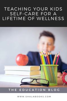 a child sitting at a desk with books and an alarm clock in front of him