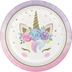 a paper plate with an unicorn face and flowers on it