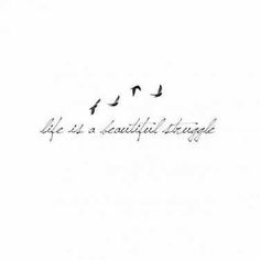 a flock of birds flying over a white sky with the words life is a beautiful language