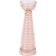 a pink glass vase sitting on top of a wooden stand with a white base in the middle