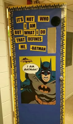 a door decorated with an image of batman and saying it's not who i am, but what i do that defined me