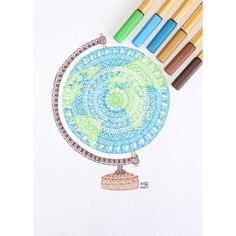 a drawing of the earth with markers and crayons