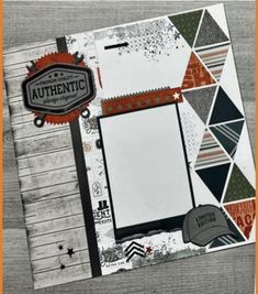 a scrapbook with an orange border and some papers on it, including a photo frame