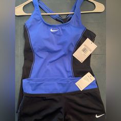 Blue And Black Nike Swimsuit Set. Size Xs Women’s, True To Size. New With Tags- Excellent Condition. Scoop Neck Line Style. Original Price $100 Paid $50 Did Not Wear Selling For $45 Nike Blue Sporty Swimwear, Fitted Blue Nike Swimwear, Nike Athleisure Swimwear For Workout, Nike One-piece Swimwear, Fitted Nike One-piece Swimwear, Nike Fitted One-piece Swimwear, Nike Fitted Sleeveless Swimwear, Blue Fitted Athleisure Tankini, Fitted Blue Athleisure Tankini