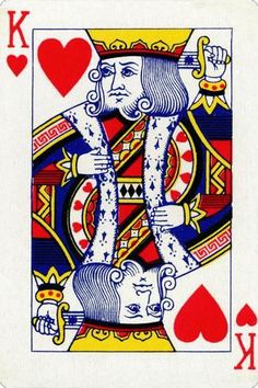 the king of hearts playing card is shown in red, yellow and blue colors with two hands on each side