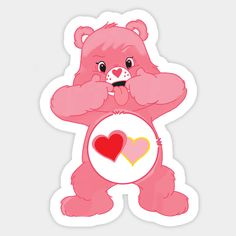 a pink teddy bear holding a heart sticker