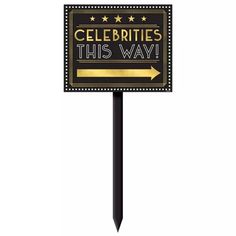 a sign that says celebrate this way with an arrow pointing to the right and stars on it