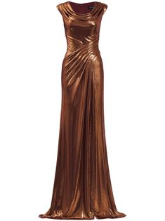 a gold dress on a mannequin dummy