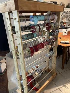 a rack with many different types of cups on it