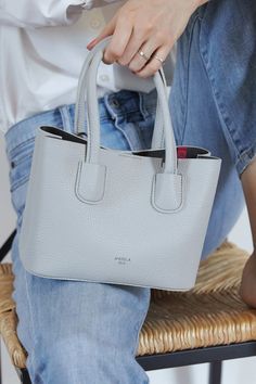 Cher Micro, the smallest version of the Cher Tote with the same design and richness, carries your essentials in a compact size. Compared to the tote and mini, the micro offers more playfulness and trendiness. Named after ‘Cher’, the it-girl with a rich taste of trend and the central protagonist of 'Clueless’,  #affiliatelink #gray #hamilton #crossbody #handbas #trends #handbags2019trends #handbags2020trends Mom Purses, Vegan Tote Bag, Popular Handbags, Fabric Handbags, Green Handbag, Handbag Pattern, Handbags Affordable, Guess Handbags, It Girl