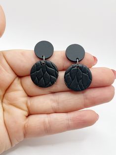 Fancy artisanal bohemian chic earrings with round black acrylic studs in lightweight matte black polymer paste, unique handmade Black Matte Finish Jewelry Gift, Minimalist Matte Black Jewelry For Gifts, Minimalist Matte Black Jewelry Gift, Minimalist Black Matte Finish Jewelry, Handmade Black Dangle Earrings, Trendy Round Polymer Clay Jewelry, Minimalist Handmade Black Earrings, Handmade Black Polymer Clay Earrings, Nickel-free Black Polymer Clay Jewelry