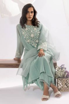 Aqua kurta with contrasting floral pattern embroidered sleeves and front yoke with side kalis. Comes with an inner slip. - Aza Fashions Fitted Sets With Embroidered Sleeves For Transitional Season, Chikankari Embroidered Chanderi Palazzo Set With Long Sleeves, Chanderi Palazzo Set With Chikankari Embroidery Long Sleeve, Chanderi Palazzo Set With Chikankari Embroidery, Spring Anarkali Set With Long Sleeve And Resham Embroidery, Spring Anarkali Set With Resham Embroidery And Long Sleeves, Cotton Silk Kurta With Embroidered Sleeves, Long Sleeve Cotton Silk Kurta With Embroidered Sleeves, Eid Straight Kurta Set With Embroidered Sleeves