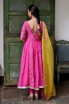 Magenta hand embroidered anarkali with gota and resham dori embroidery. Paired with golden yellow organza dupatta and magenta lycra churidar.
Component: 3
Embroidered
Neckline: V-Neck
Sleeve Length: Elbow
Fabric: Anarkali: Chanderi; Churidar: Lycra; Dupatta: Organza
Color: Pink
Deep back V-Neck
Hand embroidered with gota dori in floral jaal, resham dori and sequins in aztec pattern - Aza Fashions Embroidered Anarkali Set In Dola Silk, Anarkali Traditional Wear With Dori Work In Dola Silk, Floor-length Embroidered Cotton Silk Dupatta, Embroidered Cotton Silk Floor-length Dupatta, Embroidered Floor-length Cotton Silk Dupatta, Designer Dori Work Anarkali Set In Dola Silk, Designer Dola Silk Anarkali Set With Dori Work, Unstitched Anarkali Set With Dori Work, Transitional Anarkali Set With Dori Work In Raw Silk