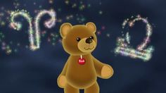 a brown teddy bear standing in front of fireworks