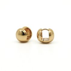 Spice up your earring game with our Sidney Ball Hoop Earrings in Gold. These 11mm hoops are not your average hoops - they add a playful pop to any outfit while remaining lightweight for everyday wear. Get ready to turn heads with these fun and quirky earrings! - Measures 11mm in diameter- Hypoallergenic, water-resistant- Heavy 18kt Gold Plate over brass with e-coating for extra longevity ** Our pieces are plated 1 micron thick, industry standard is .125. Quality is extremely important to us, and Stationary Paper, Quirky Earrings, Back Jewelry, Book Candle, Earrings In Gold, Dried Floral, Glass Ceramic, Paper Goods, Spice Up