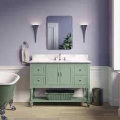 a bath room with a sink and a bath tub next to a mirror on the wall