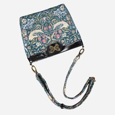 Step into a world of elegance with the Carpet Crossbody Bag - a stunning fusion of thick chenille carpet and genuine leather, meticulously handcrafted to elevate your daily ensemble. Adorned with a charming bronze metal butterfly design swirl lock, this bag exudes both grace and playfulness. The sturdy cotton canvas lining ensures both durability and protection for your belongings. Inside, you'll discover a well-organized structure featuring one full-size slip pocket on one side, alongside three Tapestry Shoulder Bag With Removable Pouch, Everyday Tapestry Shoulder Bag With Detachable Strap, Vintage Tapestry Shoulder Bag With Detachable Strap, Victorian Carpet, William Morris Strawberry Thief, Traditional Carpet, Strawberry Thief, Metal Butterfly, Carpet Bag