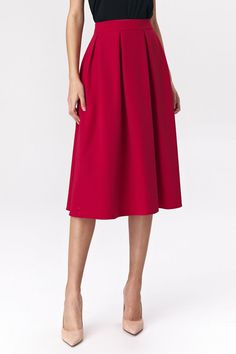 Disheveled red midi skirt is a perfect element of expressive soft office look. Paired with an elegant shirt it can be an effective alternative to classic office outfits, and paired with a strappy top - a casual, feminine outfit. Pleasant-to-touch material with a touch of viscose ensures high comfort of wearing. Skirt with lining, fastened at the back with a zip. Spandex 5 % Polyester 60 % Viscose 35 % Size Lenght Hips width Waist width 34 74 cm 92 cm 68 cm 36 74 cm 96 cm 72 cm 38 74 cm 100 cm 76 cm 40 76 cm 104 cm 80 cm 42 76 cm 108 cm 84 cm Casual Feminine Outfits, Red Midi Skirt, Red Flare, Skirt Model, Red Midi, Midi Flare Skirt, Buy Skirts, Strappy Top, La Fashion