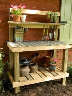 an outdoor potting bench with pots and gardening utensils