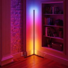 a room with a book shelf, bookshelf and purple light in the corner