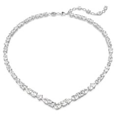 Embrace the pure refinement of this dazzling Mesmera necklace. The luminous design is made with a string of eye-catching Swarovski Zirconia on a rhodium plating setting in a surprising mix of cuts and sizes. For extra luxury, the elongation is completed with a lobster closure and a scattering of striking Swarovski Zirconia. Gift this to a loved one for a style to be worn again and again. Swarovski Millenia Necklace, Elegant Jewelry Silver, Crystal Necklace Designs, Hogwarts Style, Formal Necklace, Charms Pandora, Swarovski Necklace, Luxury Necklace, Holiday Earring