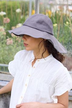 Handmade from lightweight and breathable cotton, this crusher hat is a chic update to a terrain classic with an asymmetrical brim. Packable construction pairs with UPF 50 sun protection and an inner drawstring to assure a comfortable fit. | Asymmetrical Brim Cotton Crusher Hat, Solid by Terrain in Grey, Women's at Anthropologie Firming Serum, Sun Hat, Upf 50, Sun Protection, Apparel Accessories, Anthropologie, Top Brands, Comfort Fit, Sun