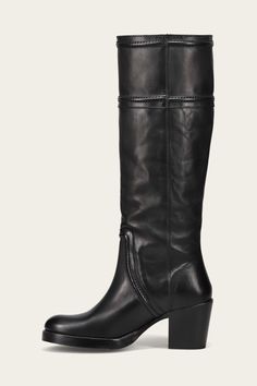 A stylish stacked heel and heritage raised stitching add versatility to the Jean Tall Pull On Boot. This modern feminine silhouette features a wide calf for convenience, a sole with rubber forepart for traction and pull tabs for ease of entry. Clean lines Quality Leather Boots, The Frye Company, Black Chocolate, Modern Feminine, Wide Calf Boots, Chocolate Caramel, Boho Skirts, Leather Boots Women, Pull On Boots