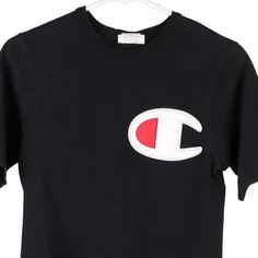 Description:Vintage black Champion t-shirt, fits x-small.GENDER: mens CONDITION: very good.STYLE: t-shirtERA: 1990sCOLOUR: blackFABRIC: cotton Vintage Black T-shirt With Graphic Design, Vintage Black T-shirt With Letter Print, Vintage Black T-shirt With Screen Print, Vintage Black Crew Neck T-shirt, 90s Black T-shirt With Graphic Design, Black Grunge T-shirt With Logo Print, Good Style, Shirt Fits, Wholesale Shoes