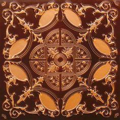 an intricately designed brown and gold tile