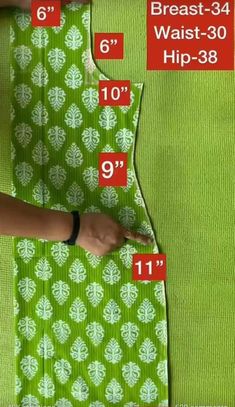 sewing instructions for the waist and back of a green dress with white flowers on it