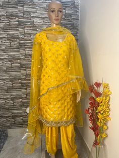 This is 3 piece salwar suit.custom made party wear outfit. Top is made in banarse brocade fabric . Dupatta in net fabric. Salwar in silk fabric. Stitching  For stitched dresses you can chose from size chart or can message us for customization.our team will send you size chart for customization. Feel free to convo for any details to help you in your selection because customize dresses cannot be return or exchange. Note: color may slightly vary because of different screen resolutions. We have an e Fitted Bollywood Style Sharara In Shantoon, Shantoon Dupatta With Self Design For Diwali, Fitted Salwar Kameez With Zari Work In Shantoon, Party Nida Unstitched Suit With Traditional Drape, Nida Sharara With Straight Kurta And Dupatta, Nida Sharara With Dupatta And Straight Kurta, Diwali Fitted Anarkali Set In Shantoon, Party Dupatta For Diwali In Shantoon, Festive Sheer Shantoon Dupatta