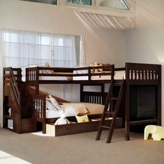 a bunk bed with two sets of drawers underneath it and a ladder to the bottom