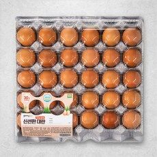 an egg carton filled with brown eggs on top of a white table next to a package