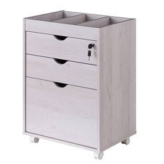 a white cabinet with three drawers on wheels