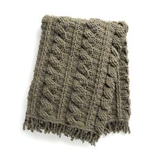 a knitted blanket on a white background