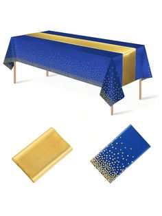 a blue table cloth with gold dots on it and two matching place mats for the table