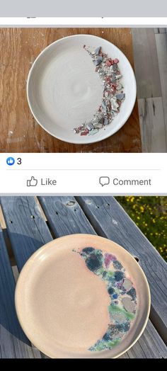 two plates with different designs on them sitting on a wooden table next to each other